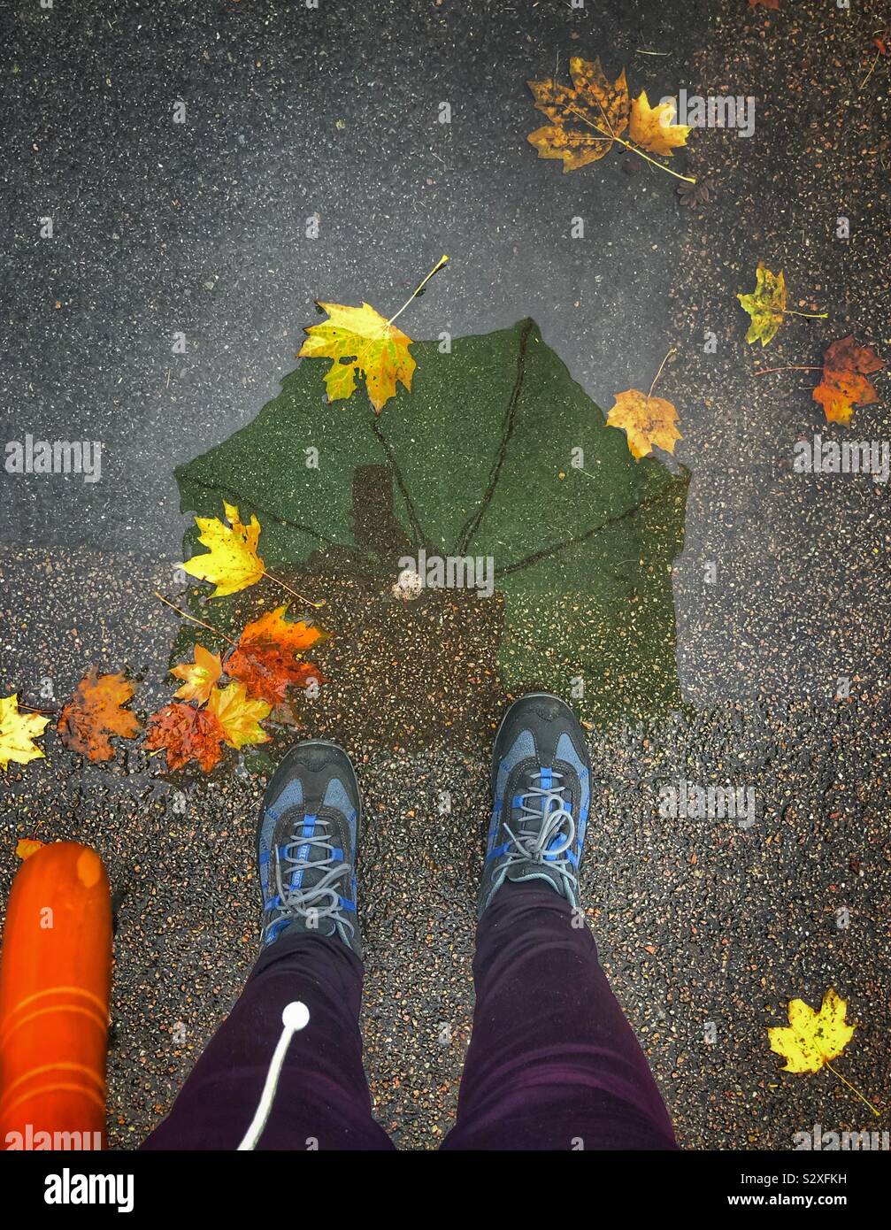 Walking in the rain - Smartphone Captured Stock Image