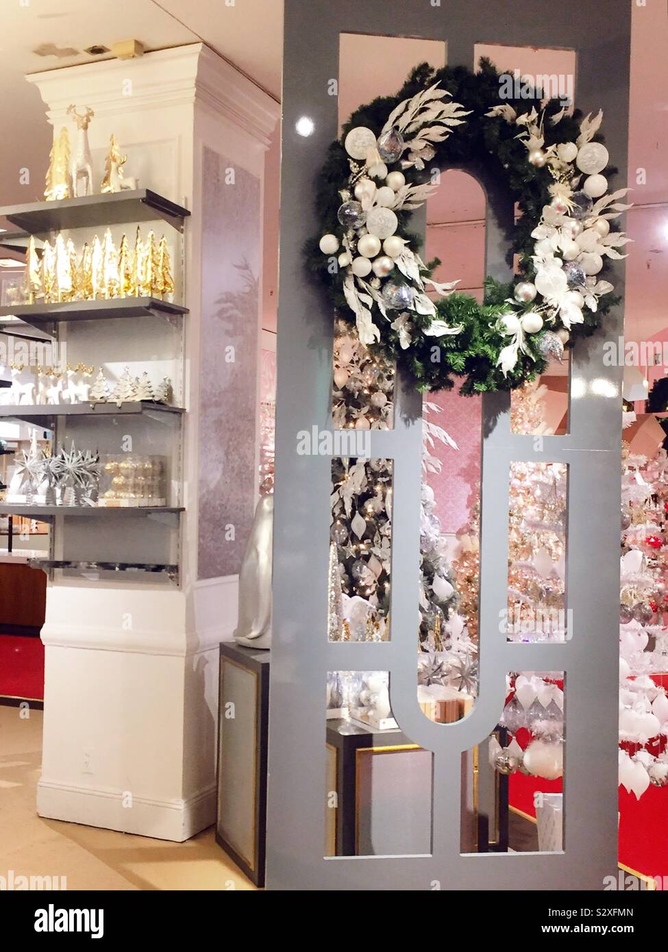 Macy’s flag ship store in Herald Square features an elaborate holiday Lane department during the Christmas season, NYC, USA - Smartphone Captured Stock Image