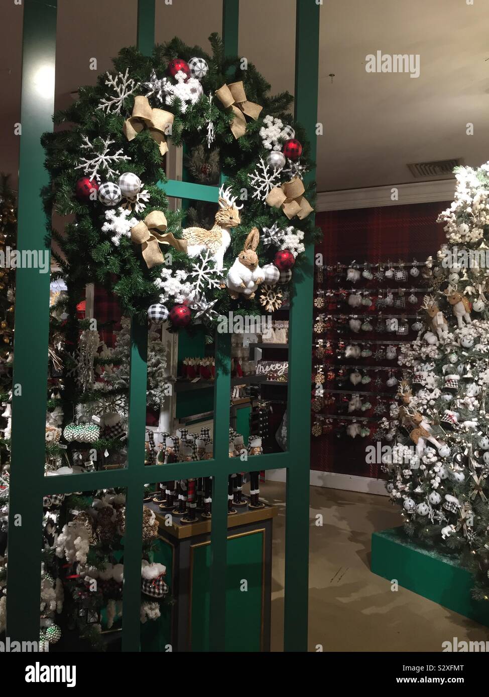 Macy’s flag ship Department store in Herald Square features an elaborate holiday Lane during the Christmas season, NYC, USA - Smartphone Captured Stock Image