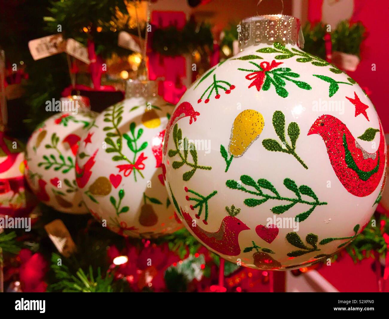 Ornaments for sale at Macy’s flag ship department store in the holiday Lane department during the Christmas season, NYC, USA - Smartphone Captured Stock Image