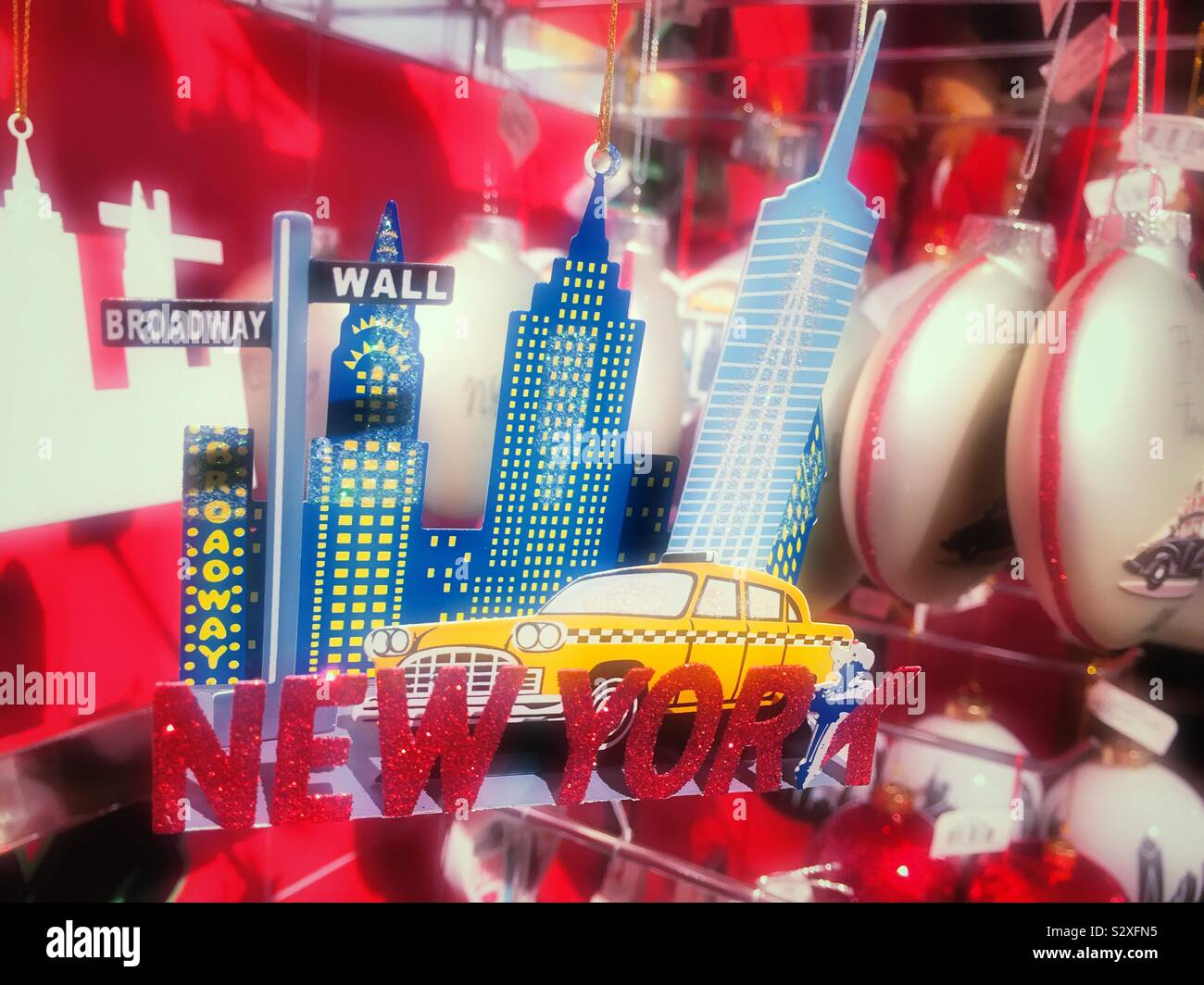 Christmas ornaments of iconic tourist attractions in New York City for sale in a department store during the holiday season, NYC, USA - Smartphone Captured Stock Image