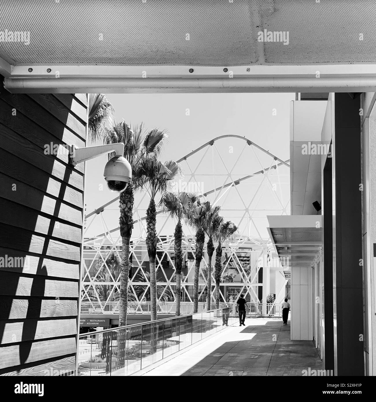 Black and white image of the walkway between the Pike Garage and the Pike Outlets, Long Beach, California, United States - Smartphone Captured Stock Image