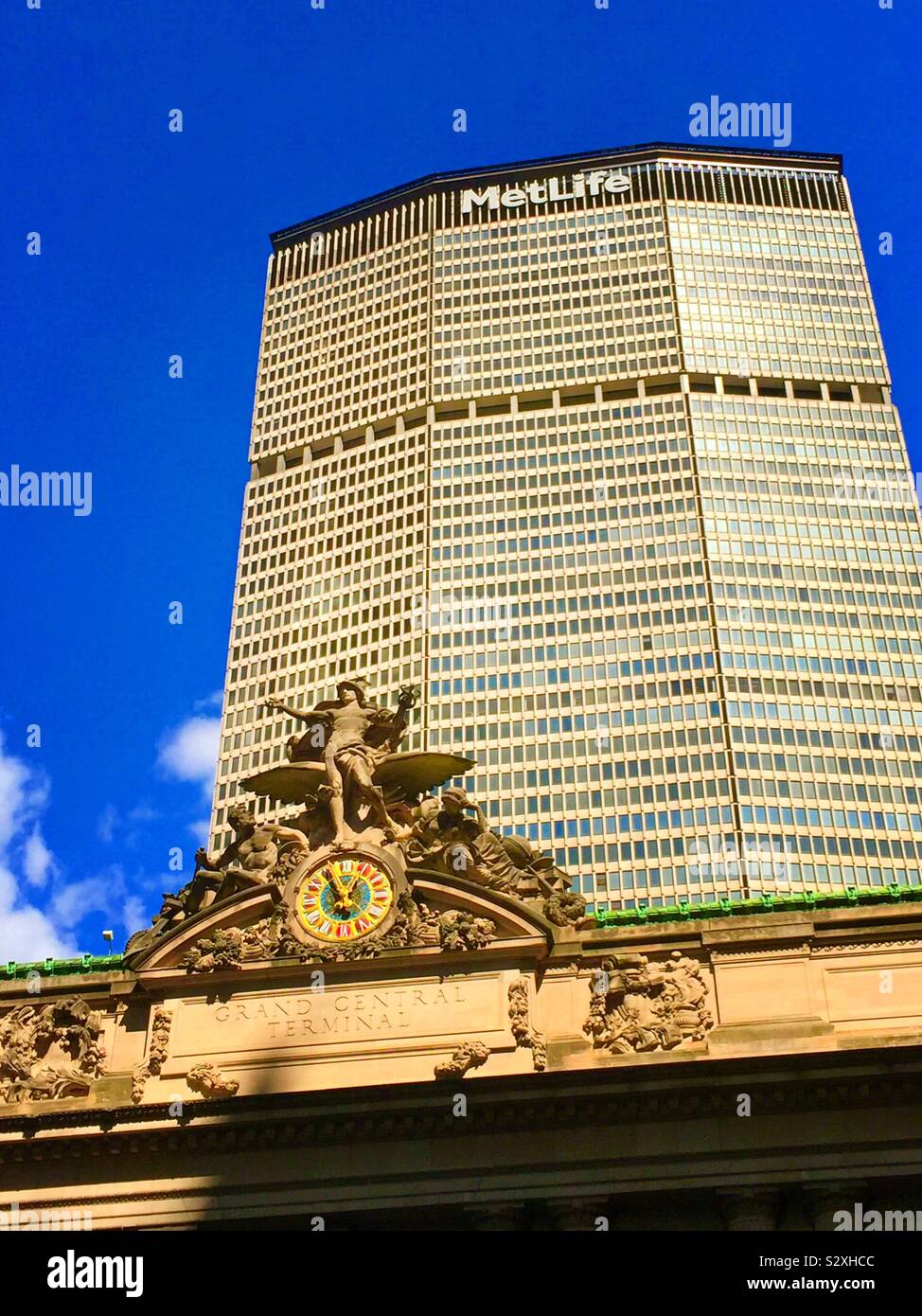 Grand Central terminal has the iconic mercury statue and Tiffany clock, NYC, USA Stock Photo
