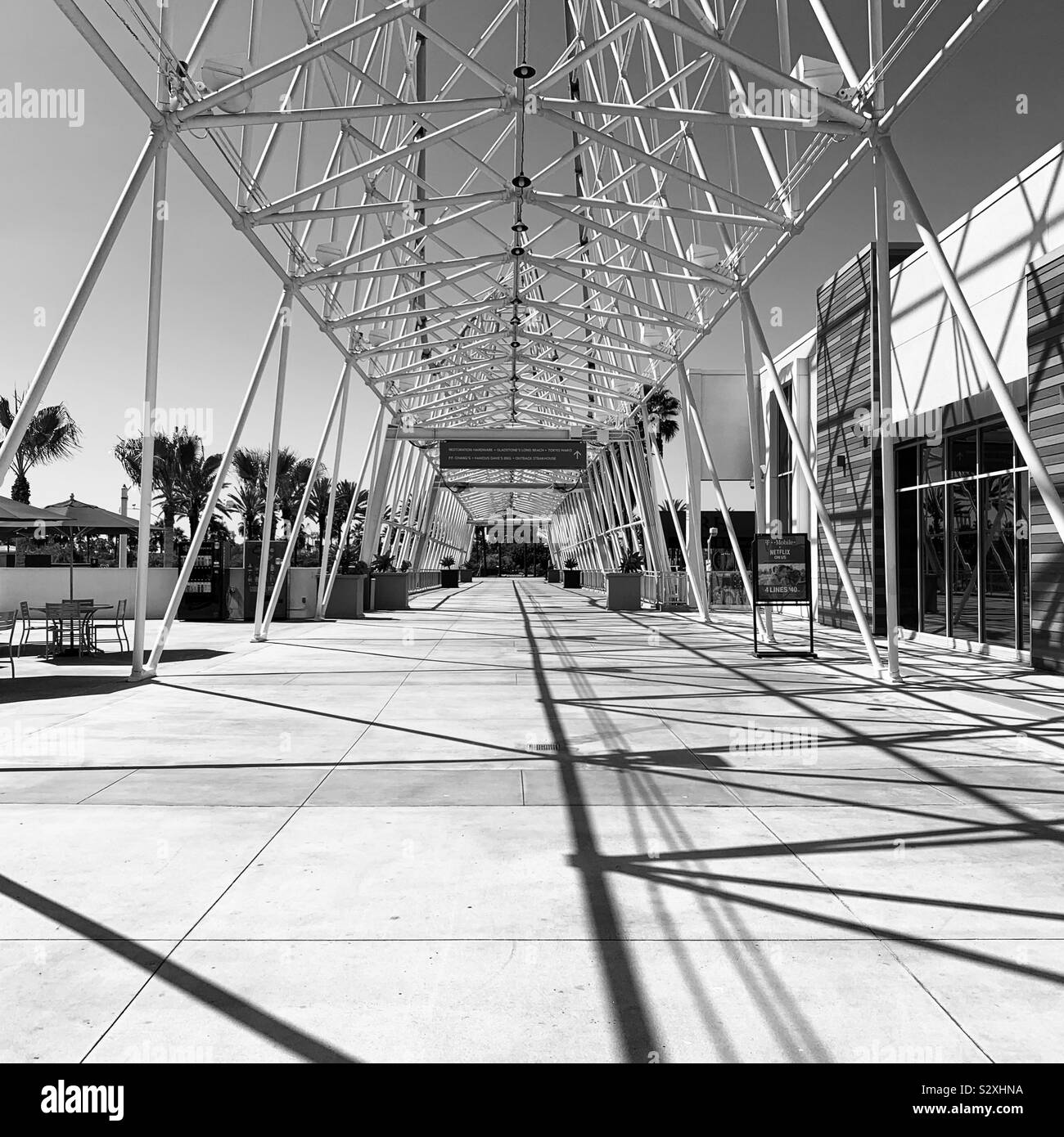Black and white image of a space between the Pike Garage and the Pike Outlets, Long Beach, California, United States - Smartphone Captured Stock Image