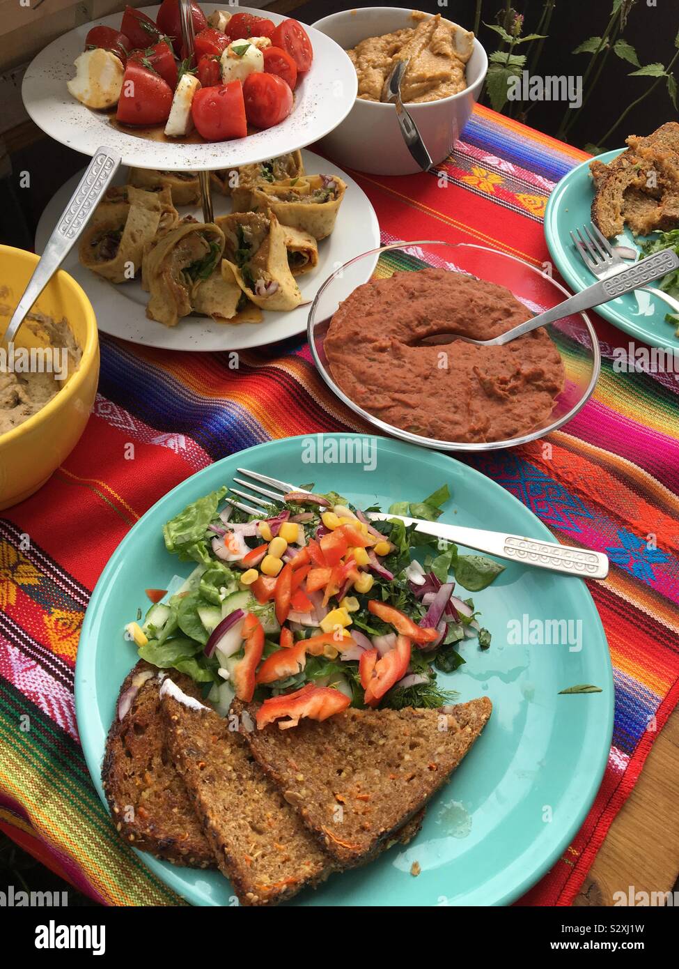 Enjoying a mexican inspired lunch on the balcony Stock Photo - Alamy