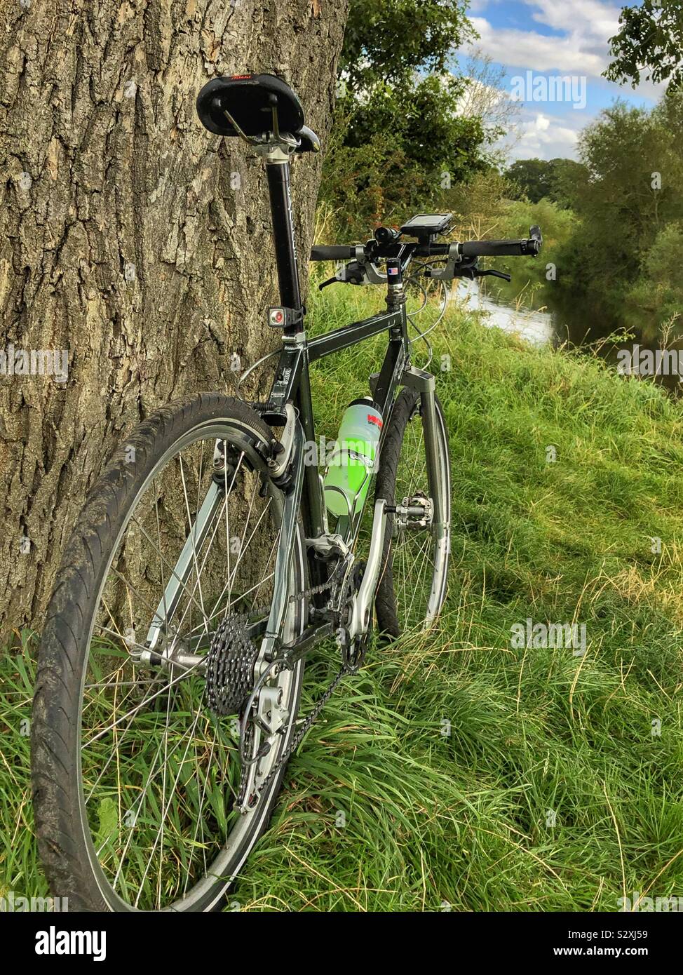 Mountain bike by the river Wharfe in West Yorkshire - Smartphone Captured Stock Image