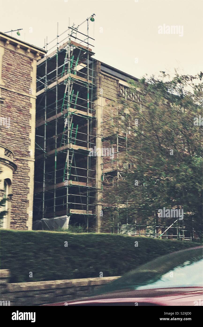 Several levels of scaffolding on the side of a building Stock Photo