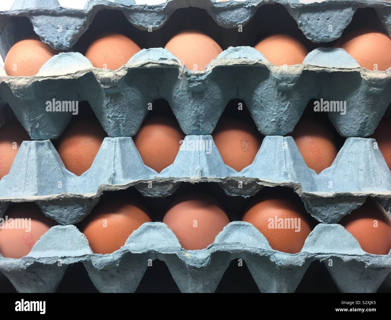 Crates of hens eggs Stock Photo