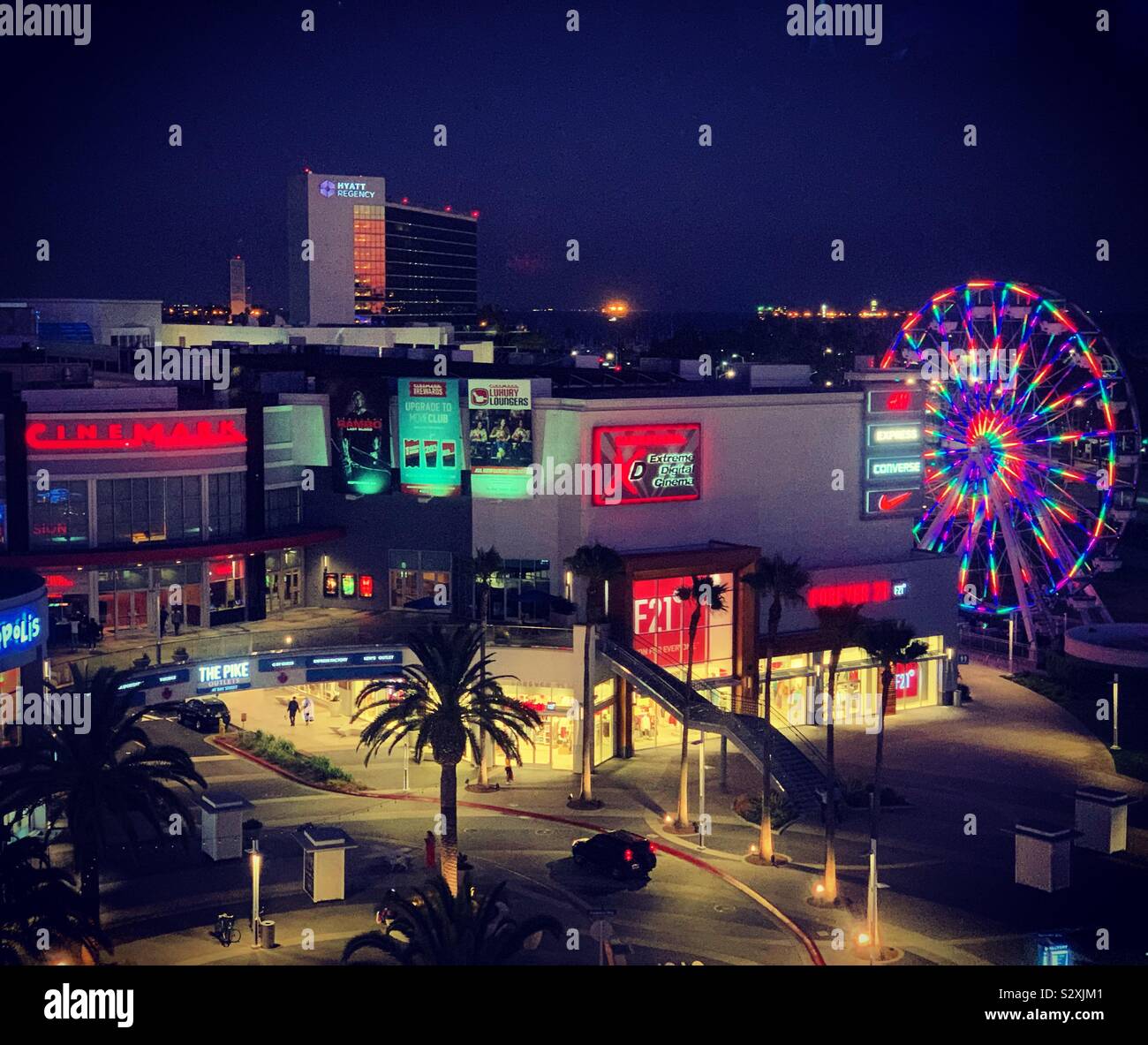 Evening view of The Pike Outlets and Ferris wheel, Hyatt Regency in the background, Long Beach, California, United States - Smartphone Captured Stock Image