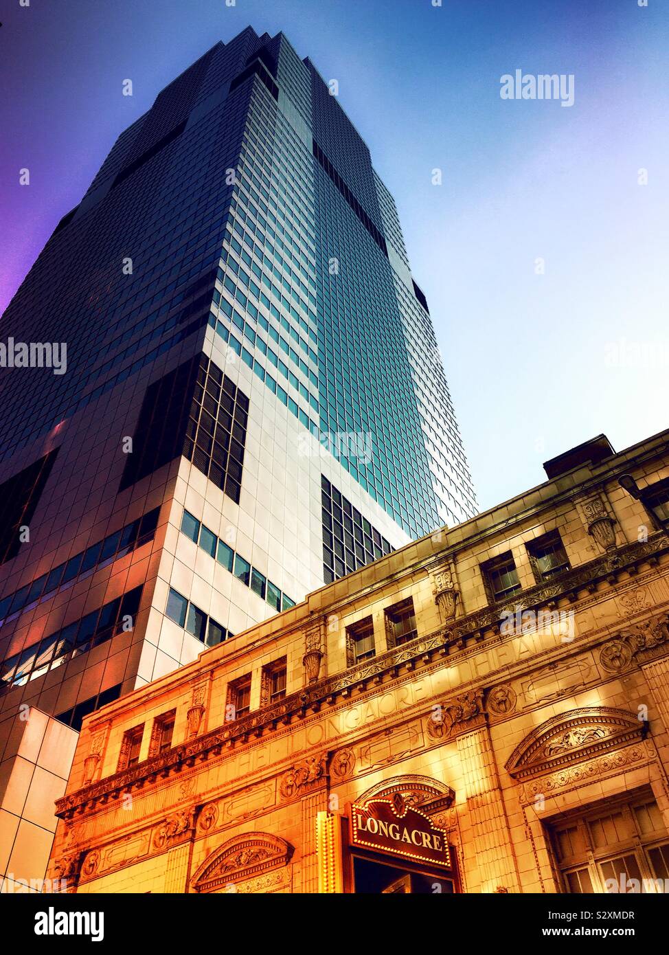 The longacre theater on W. 48th St. and a contrasting modern skyscraper in Time Square, NYC, USA - Smartphone Captured Stock Image