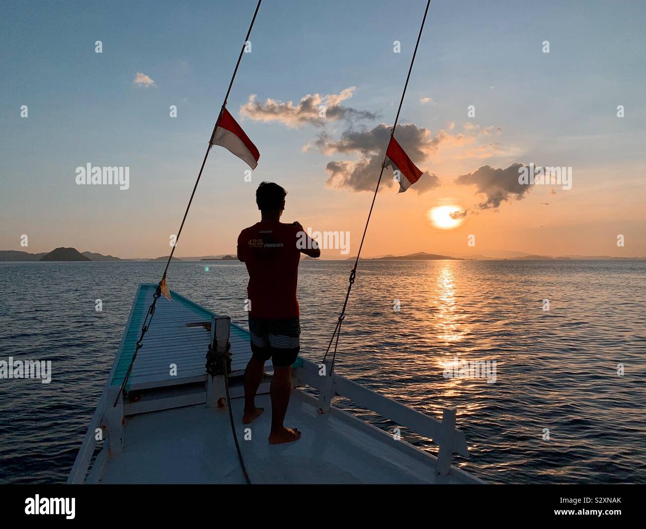 Capturing sunsets by the yatch Stock Photo