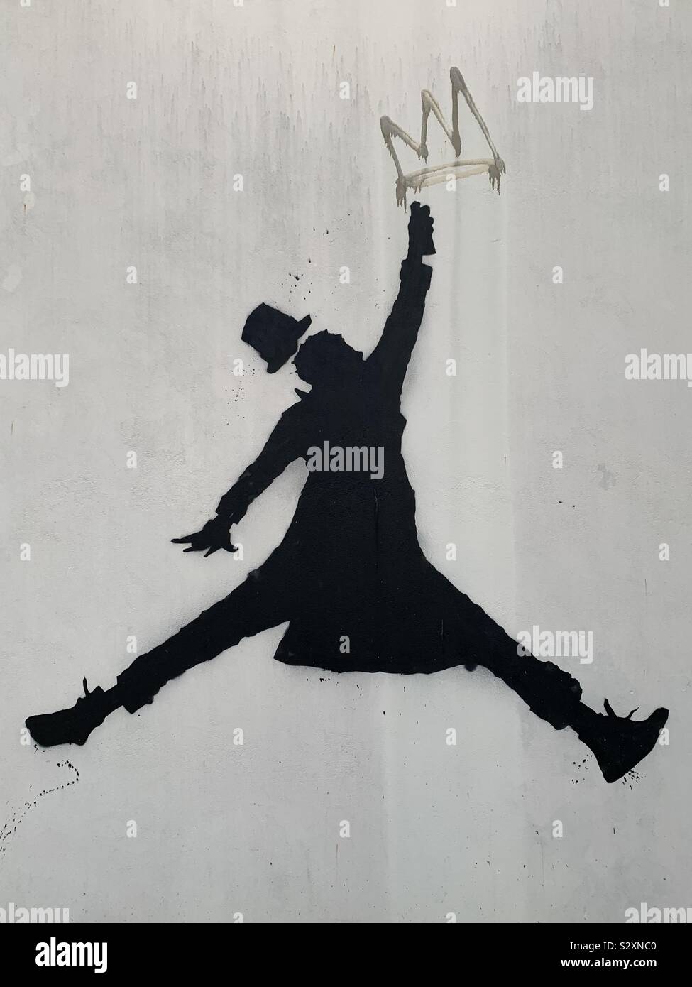 Black over white graffiti - Smartphone Captured Stock Image