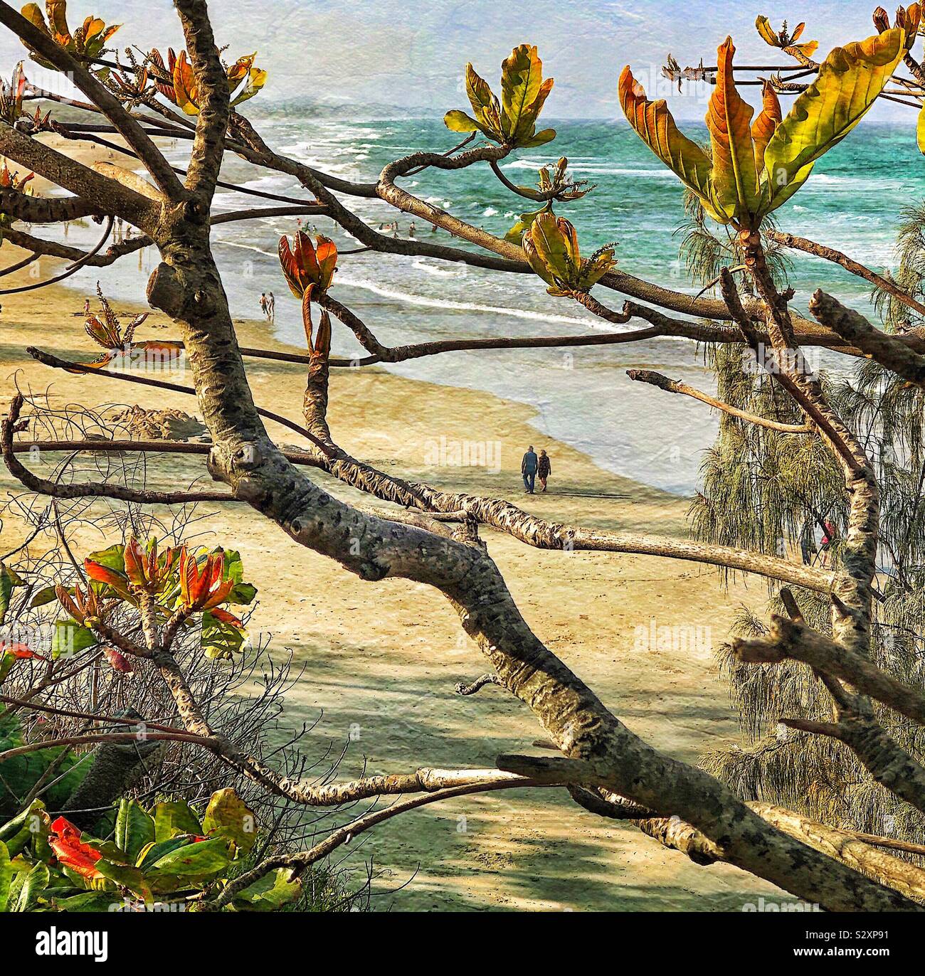 Couple Walking on Coolum Beach - Smartphone Captured Stock Image