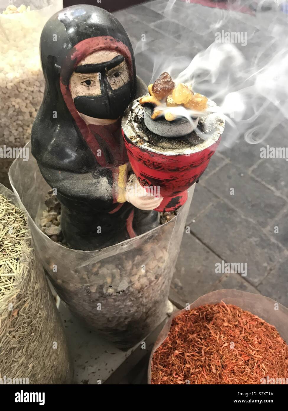 Incense burner with burning incense - Smartphone Captured Stock Image