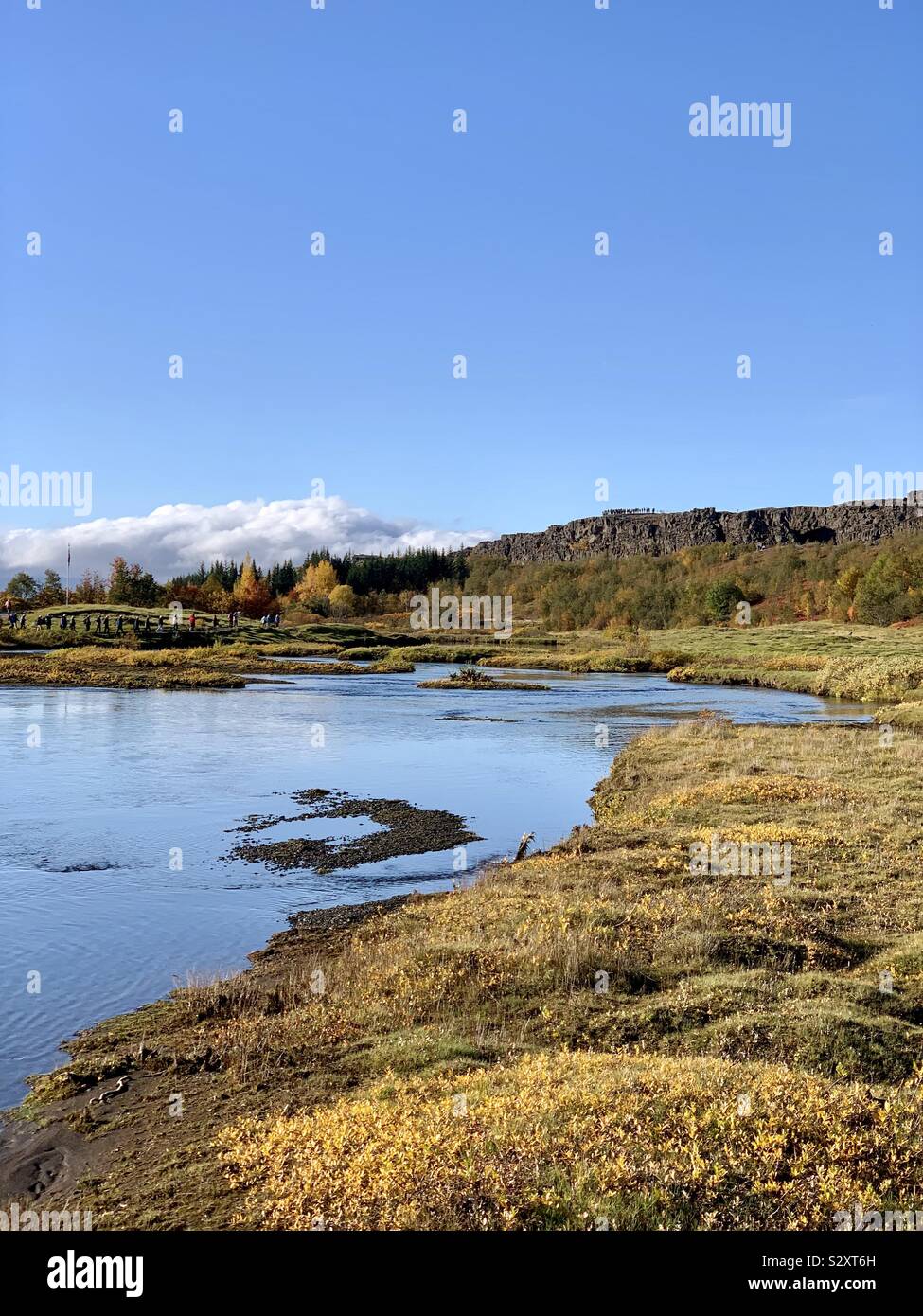 Thingvellir National Park, Iceland - September 2019: Blue water and bright autumn colours in this UNESCO world heritage site. - Smartphone Captured Stock Image