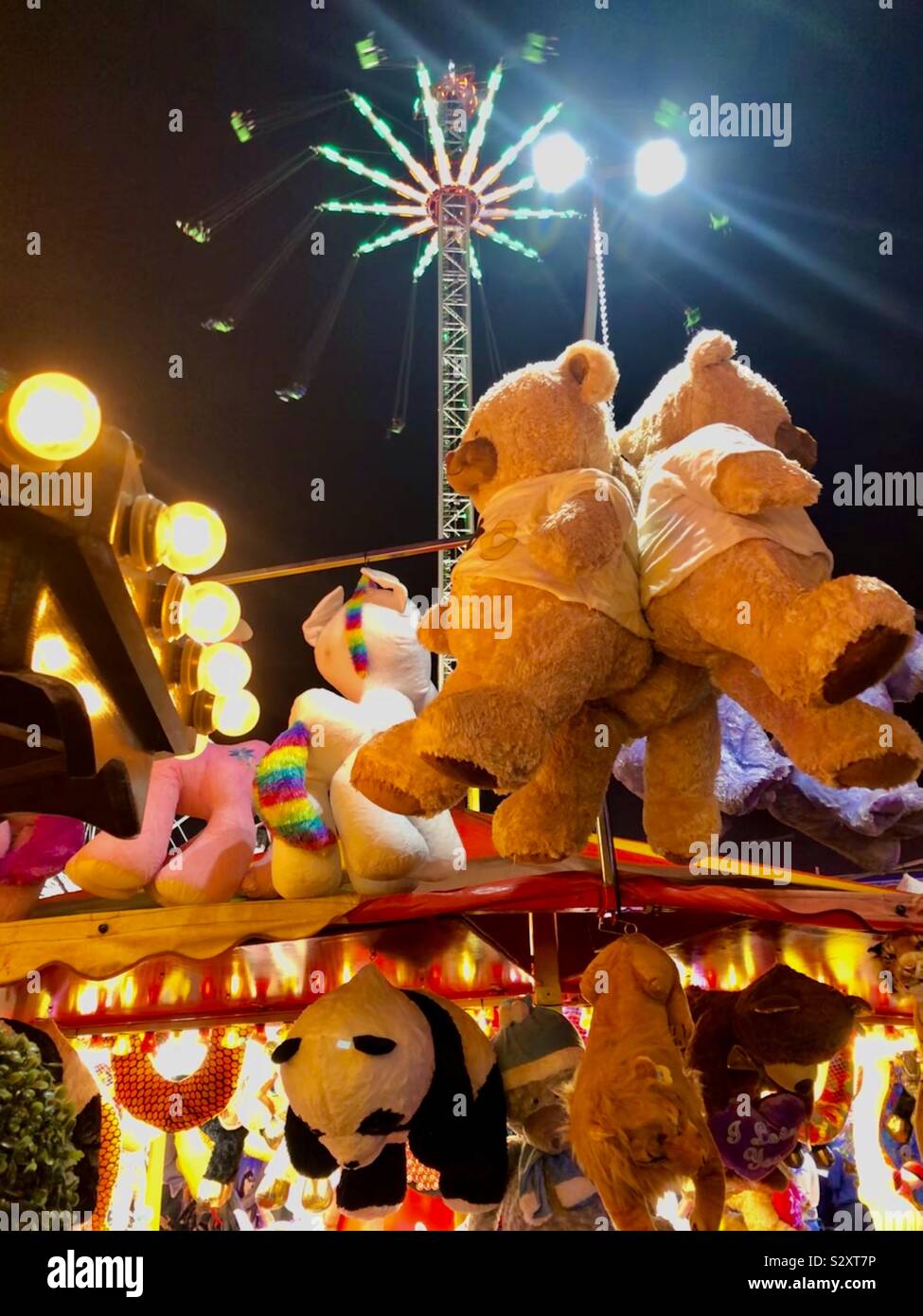 NOTTINGHAM, NOTTINGHAMSHIRE, UK - OCTOBER 4th 2019. Teddy bears and other prizes on a stall at the annual Goose Fair held on the Forest Recreation Ground. Stock Photo