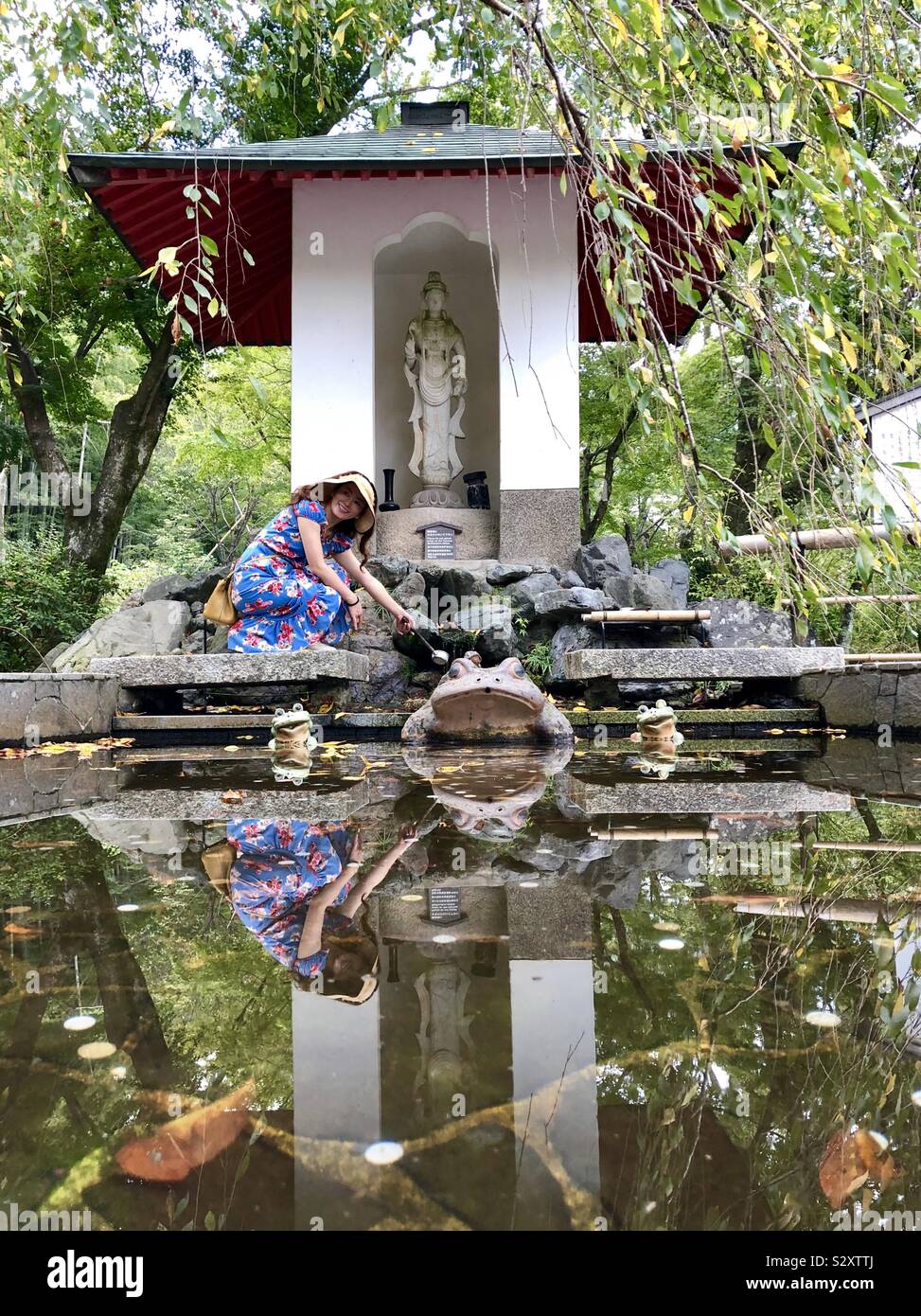 A Young Woman Makes A Wish In A Japanese Wishing Well In Kyoto Stock Photo Alamy A Young Woman Makes A Wish In A Japanese Wishing Well In Kyoto Stock Photo Alamy