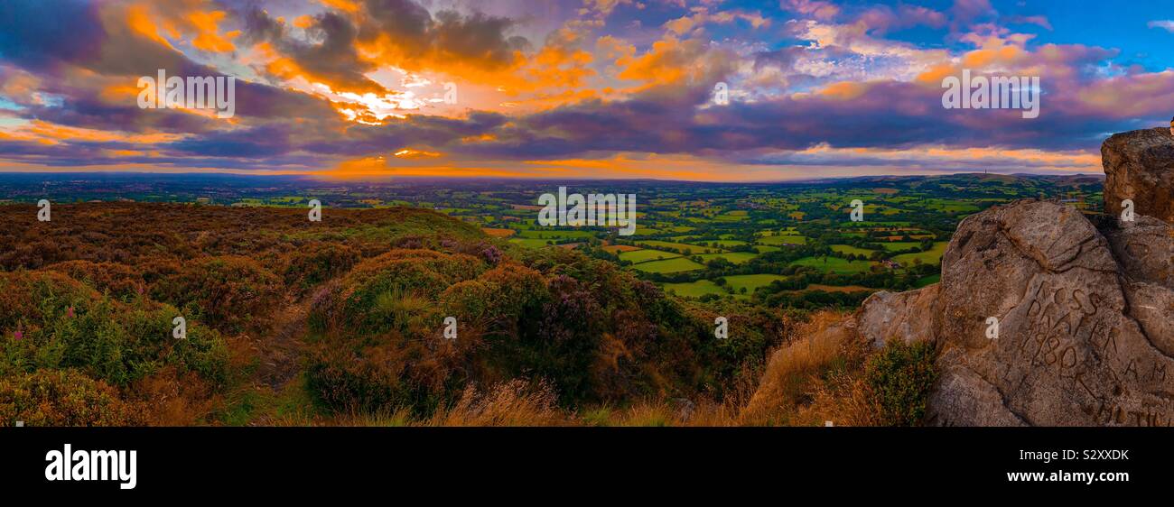 Dramatic Sunset above Bosley Cloud  near Congleton in uk, with Cheshire plain in distance Stock Photo
