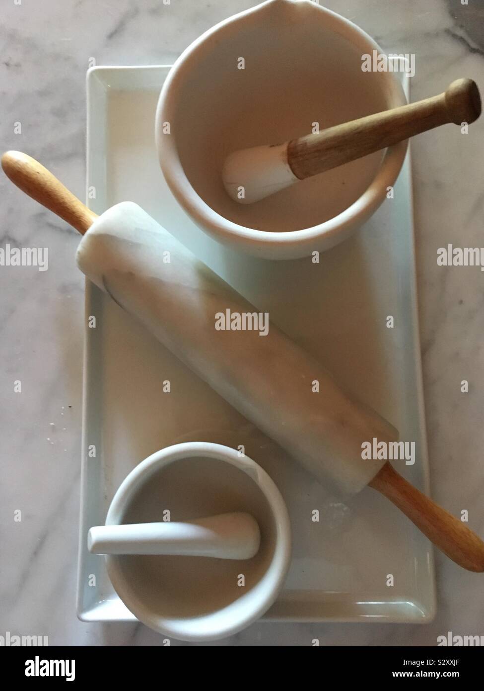 Kitchen Mortar and Pestle and Marble Rolling Pin Stock Photo Alamy