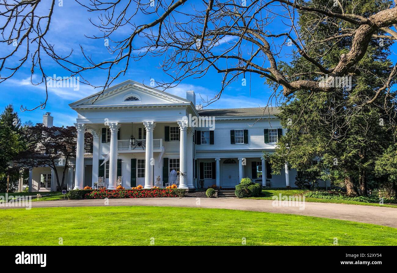 Historic Greek revival home decorated for Halloween - Smartphone Captured Stock Image