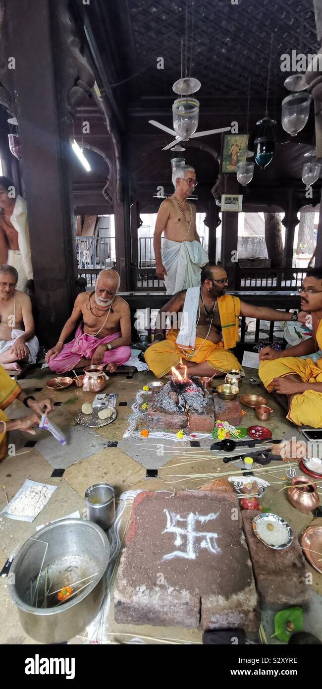 A Puja in a small Hindu temple in Pune, Maharashtra. - Smartphone Captured Stock Image