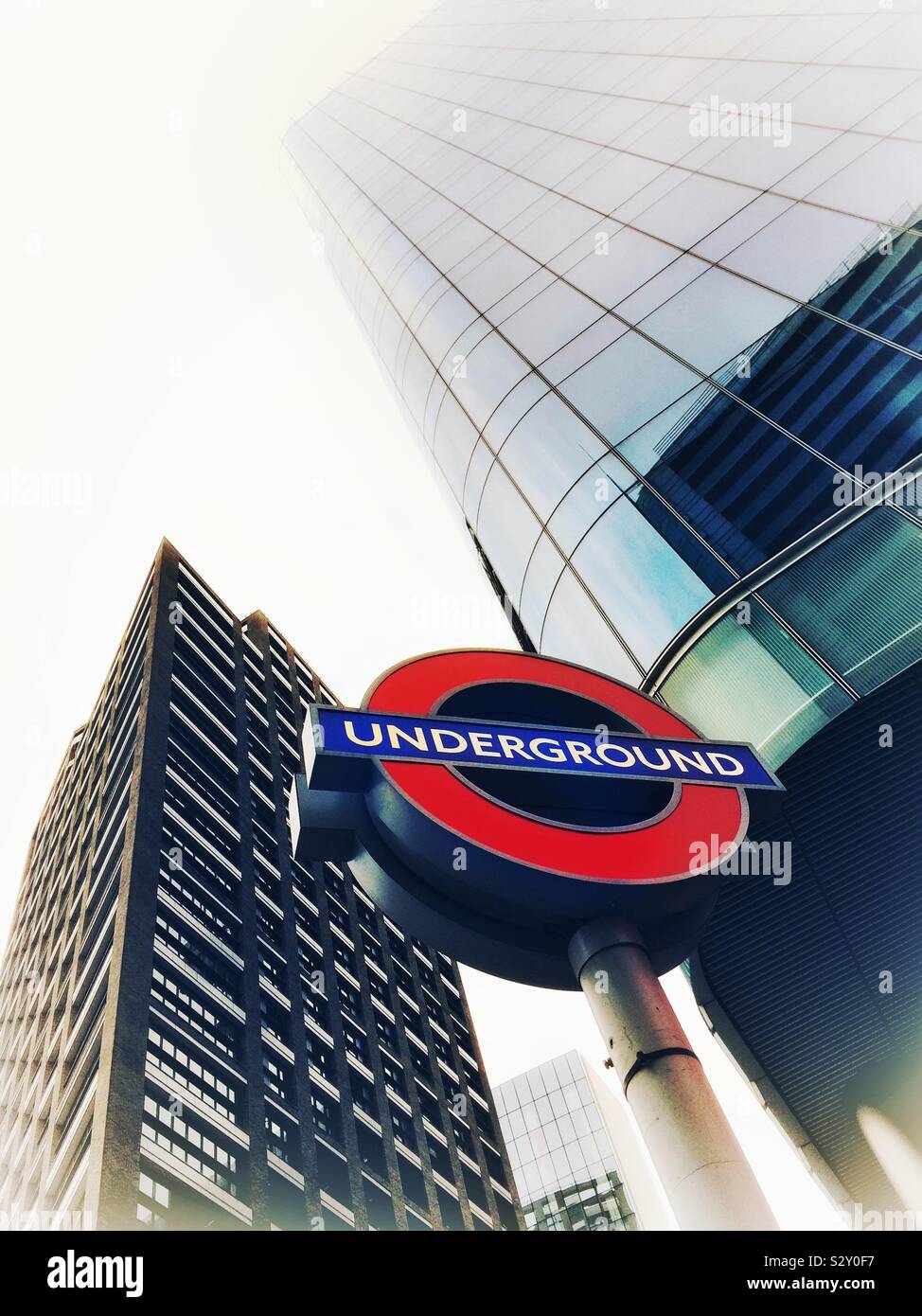 London Underground Station Sign and offices buildings, London,UK - Smartphone Captured Stock Image London Underground Station Sign and offices buildings, London,UK - Smartphone Captured Stock Image