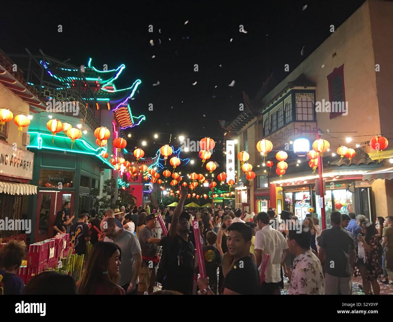 LOS ANGELES, CA, SEPT 2019: street fair with crowd of people, lights and lanterns, in Chinatown - Smartphone Captured Stock Image