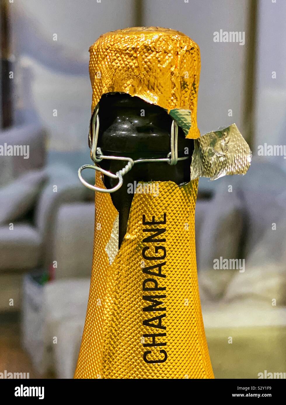 Champagne bottle being opened - Smartphone Captured Stock Image