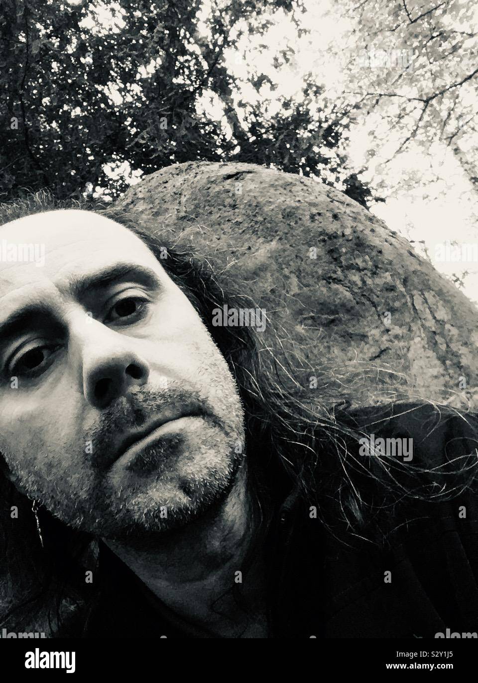 Face and stone - Smartphone Captured Stock Image