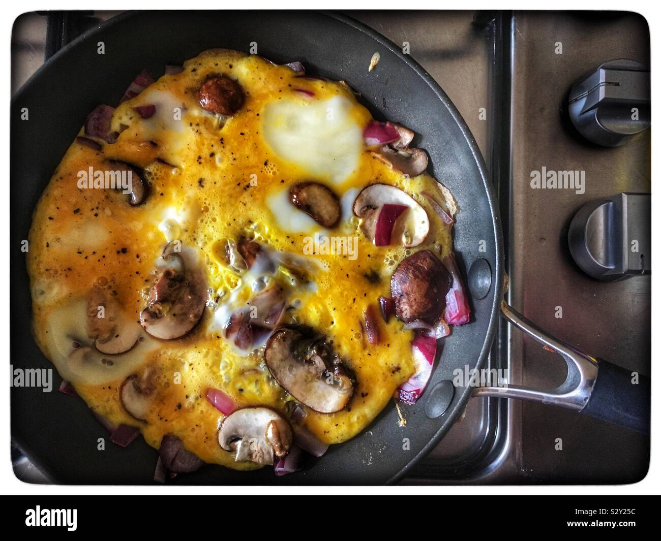 Cheese mushroom and onion omelette Stock Photo Alamy