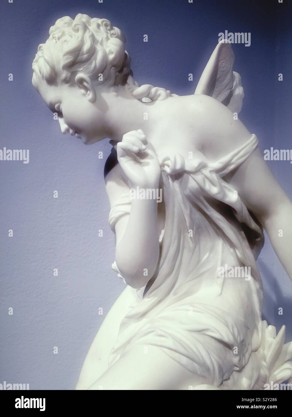 White marble statue of a delicate cherub Stock Photo Alamy
