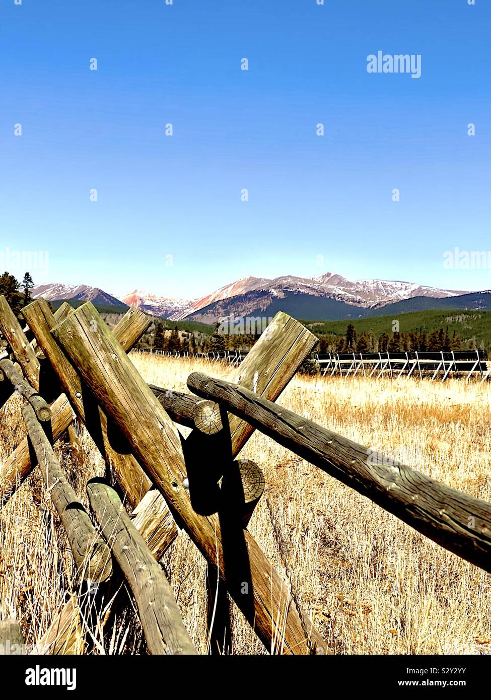 Colorado Mountains with rail fence Stock Photo