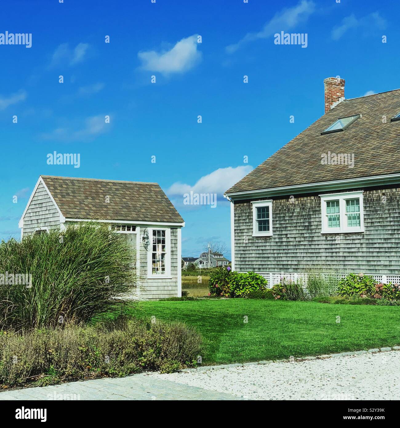 A shed and home in the town of Sandwich, Cape Cod, Massachusetts, United States - Smartphone Captured Stock Image