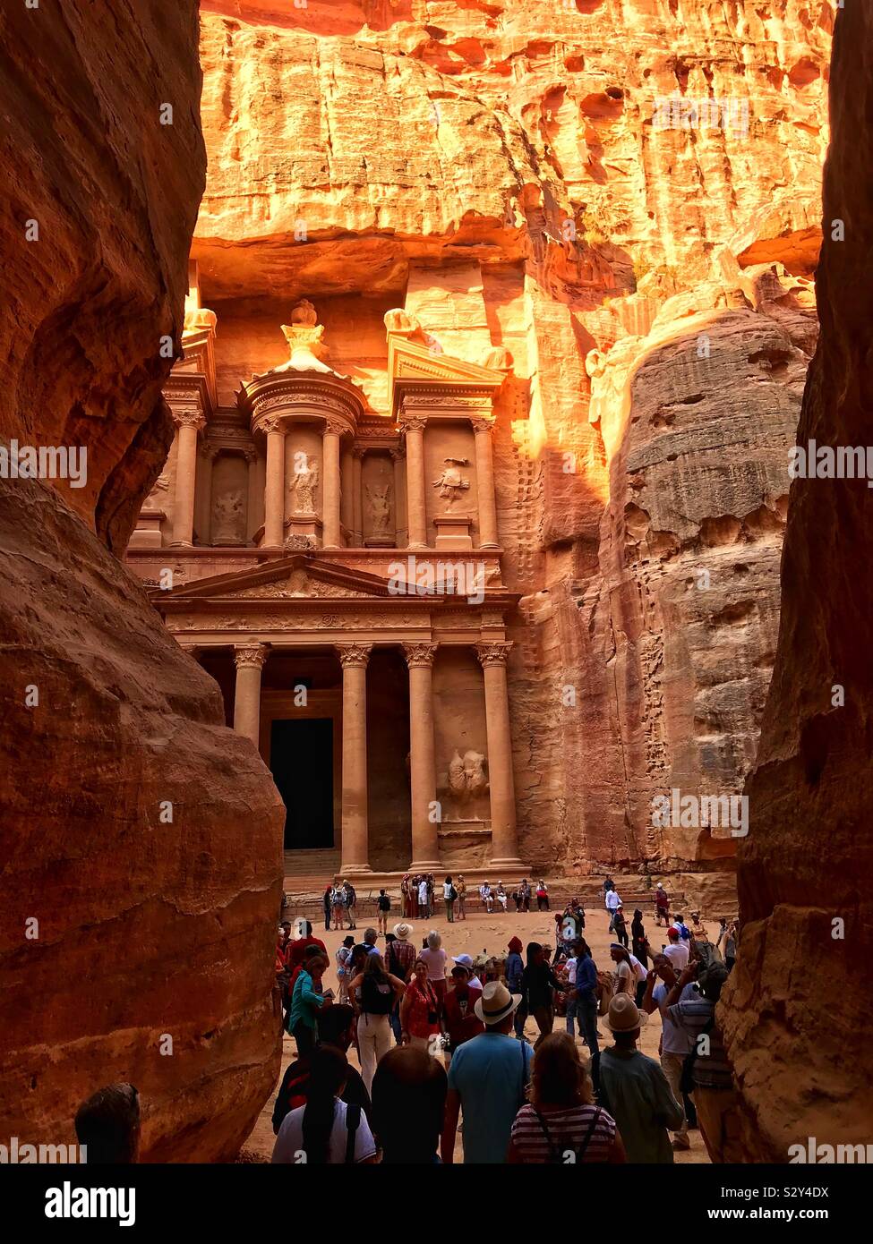Walking through the siq to the treasury at Petra. Jordan. - Smartphone Captured Stock Image