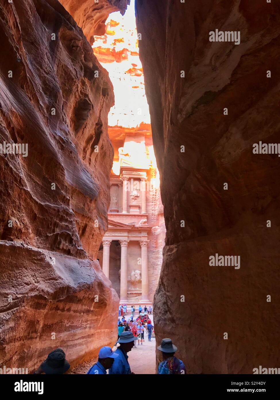 Walking through the siq to the treasury at Petra. Jordan. - Smartphone Captured Stock Image