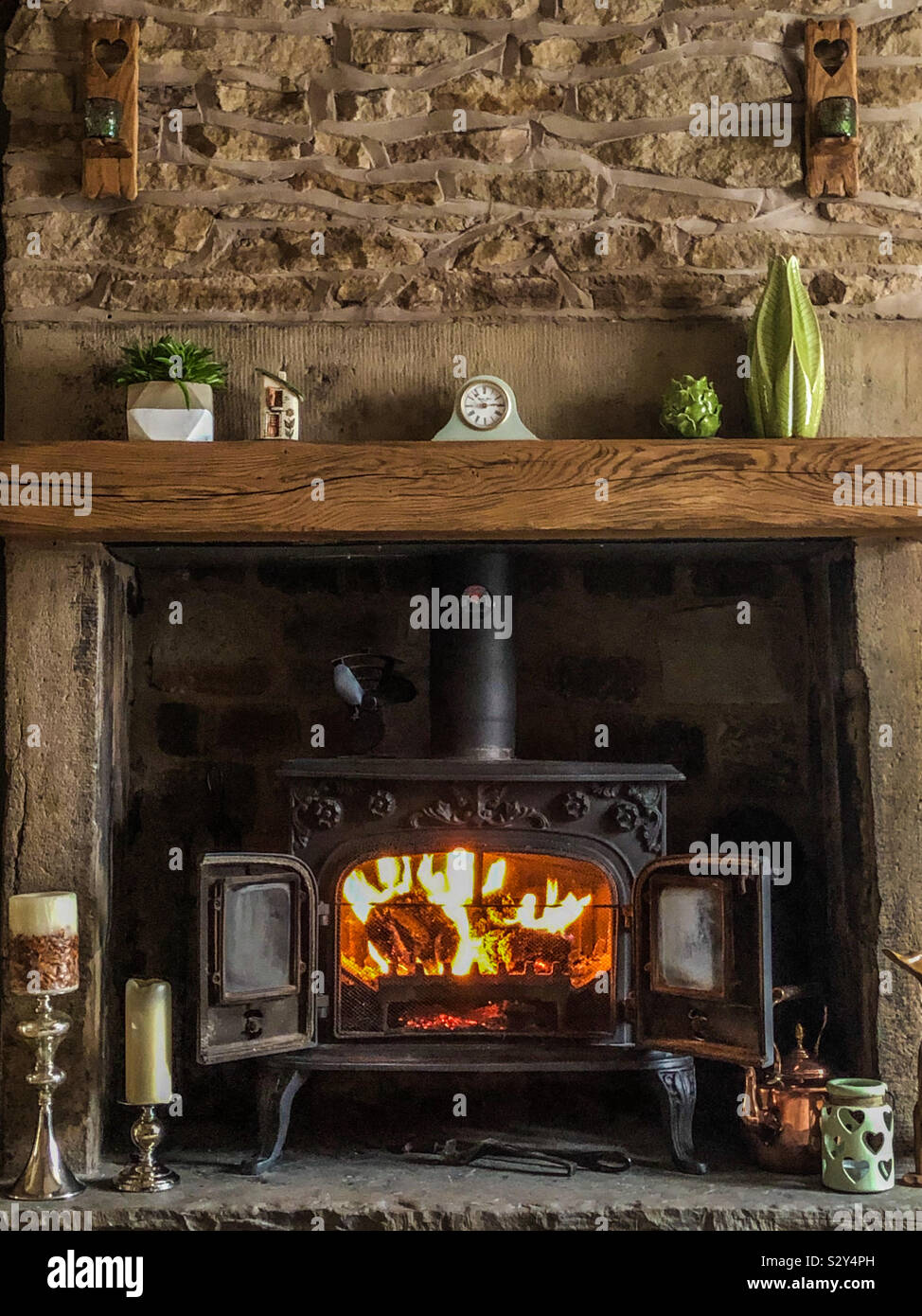 Cosy fire in a cottage,England. Stock Photo