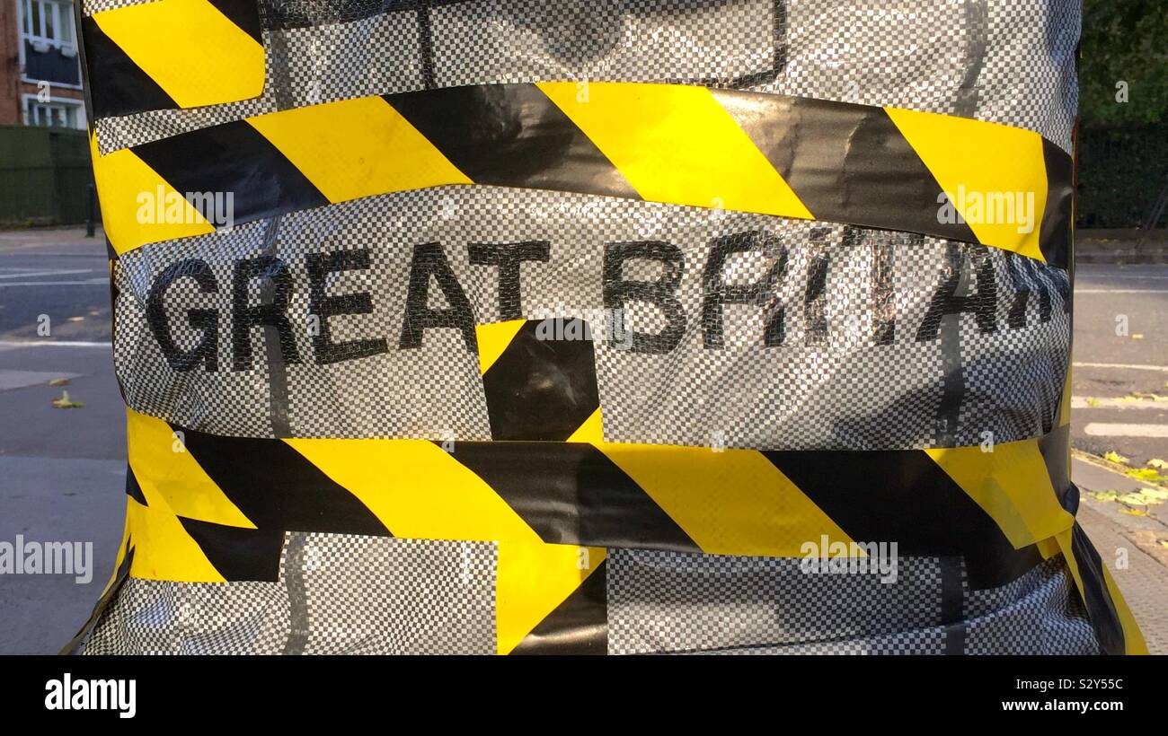Great Britain: held together by hazard warning tape - Smartphone Captured Stock Image