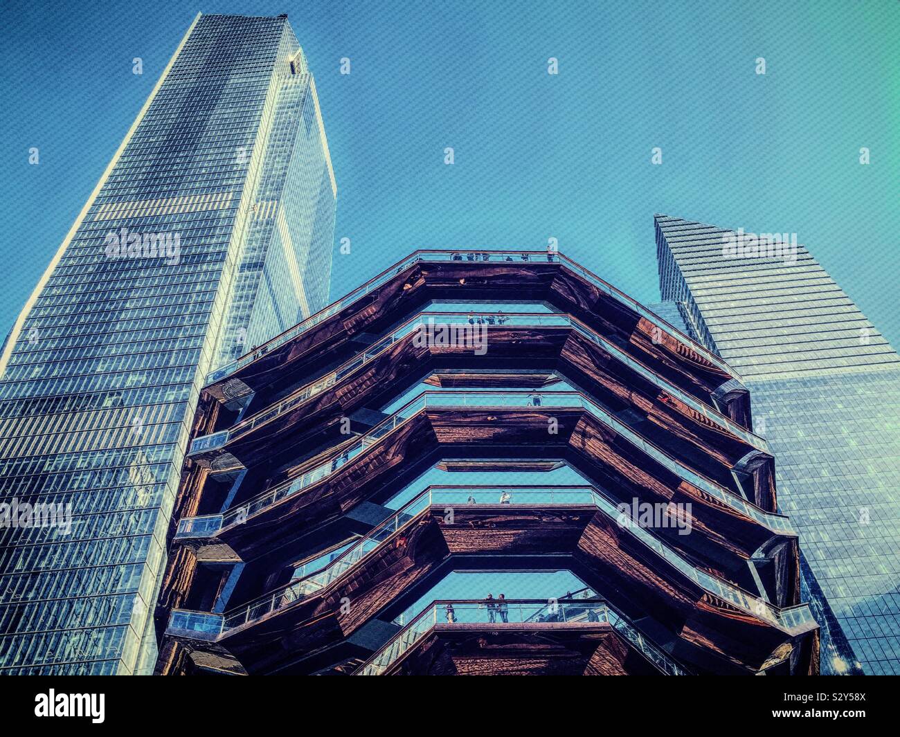 The vessel is a copper clad honeycombed viewing platform in Hudson yards, NYC, USA - Smartphone Captured Stock Image