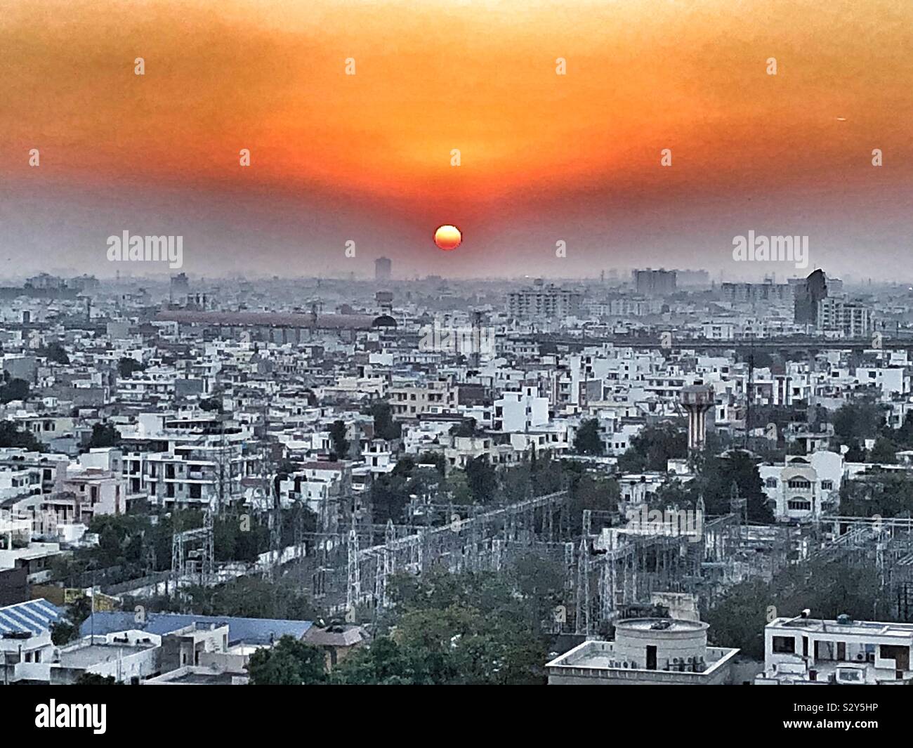 Sunset over city in India Stock Photo