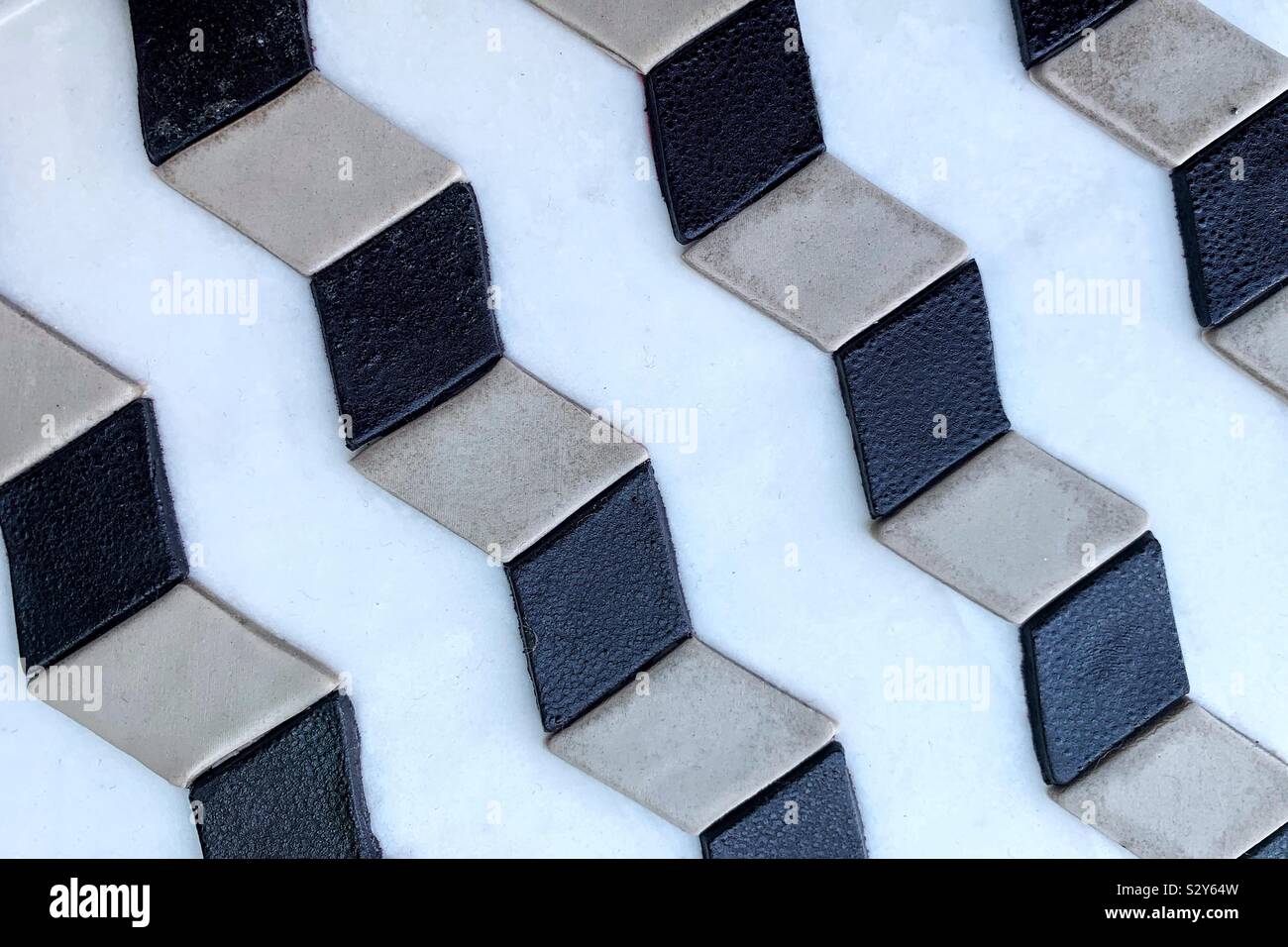 Black and white optical illusion cake frosting. - Smartphone Captured Stock Image