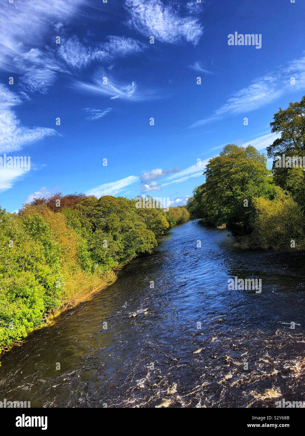 River Wharfe on an sunny autumn day in Ilkley West Yorkshire Stock Photo