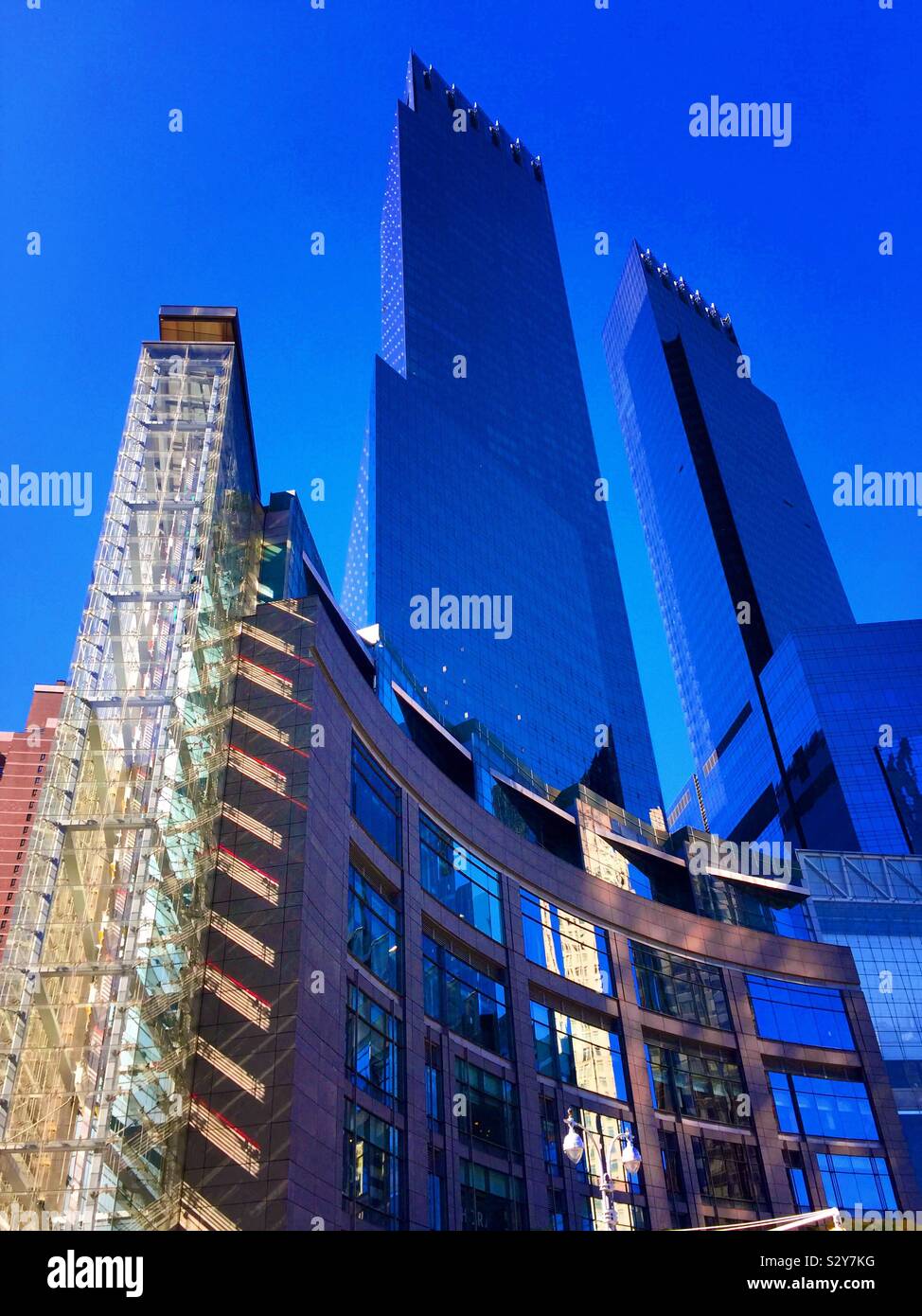The time warner center is an upscale vertical mall at Columbus Circle, NYC, USA - Smartphone Captured Stock Image