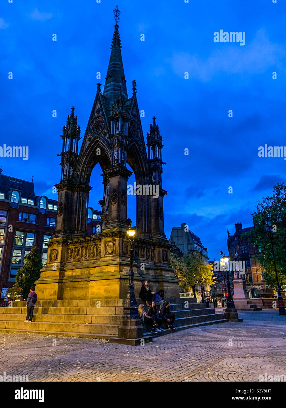 Albert Square next to the town hall in Manchester at dusk - Smartphone Captured Stock Image