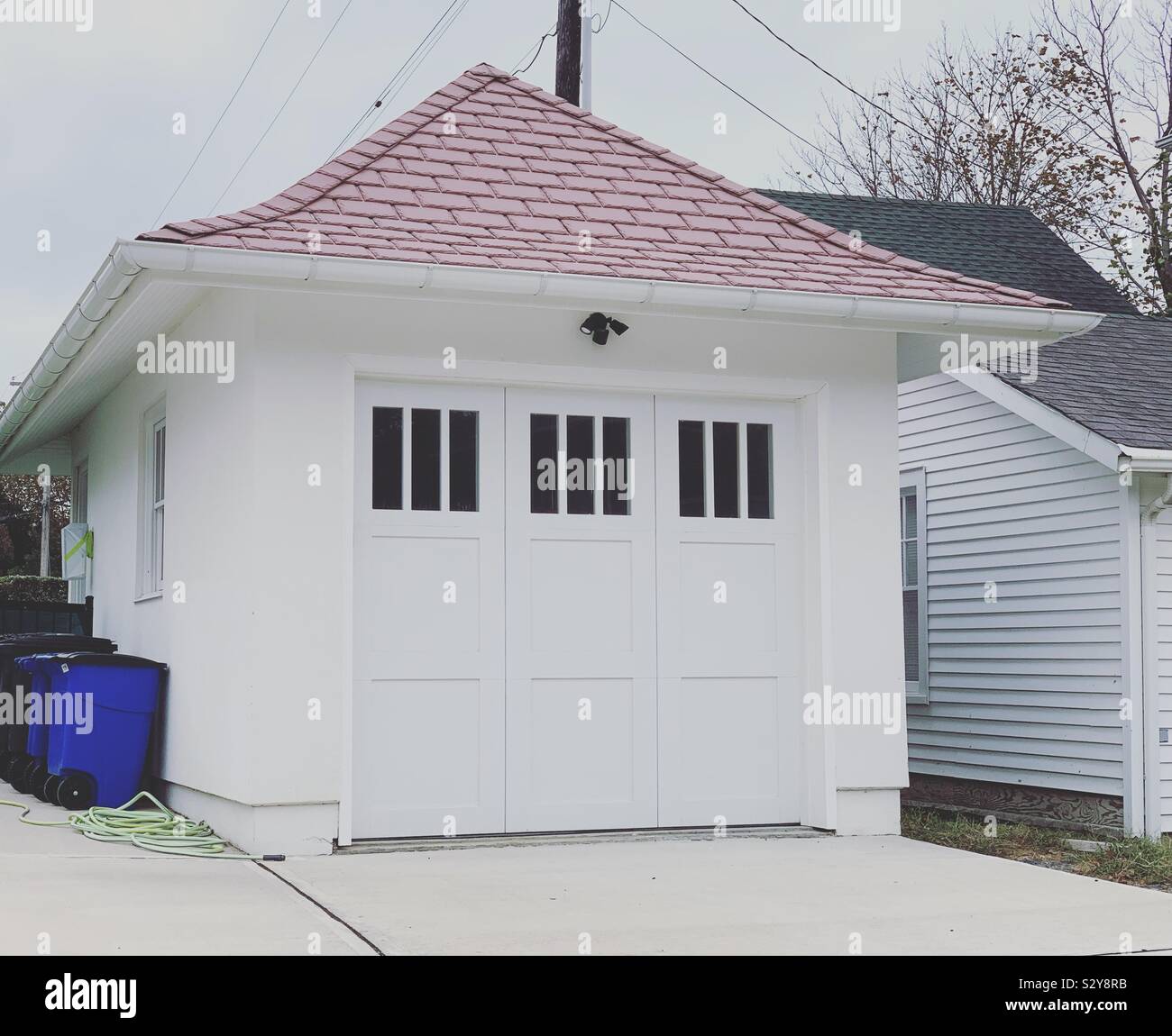 A garage next to a home in Allenhurst, Monmouth County, New Jersey, United States - Smartphone Captured Stock Image