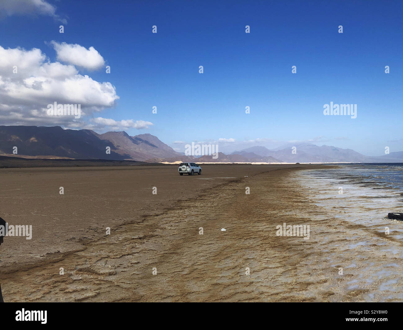Car Parked By Salt Lake In East Africa Stock Photo Alamy