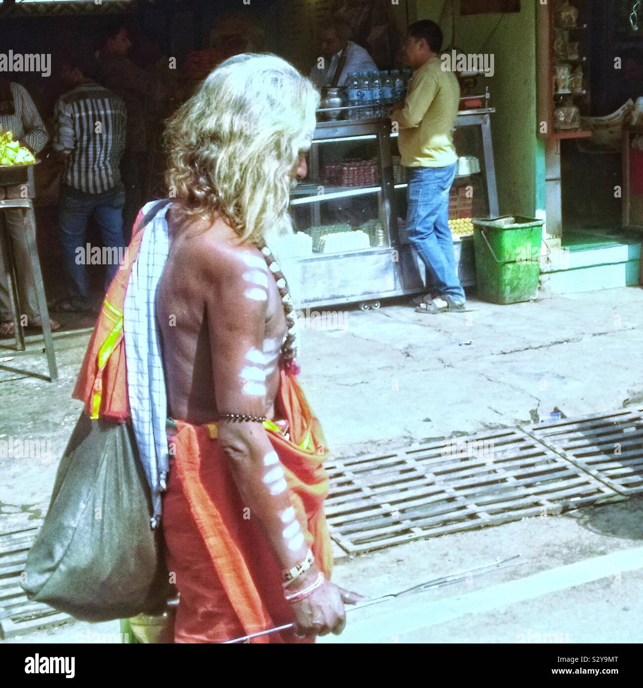 Sadhus with their chosen path of solitude, even though they at times roaming through metropolitans, they always seem to rest inside. Stock Photo