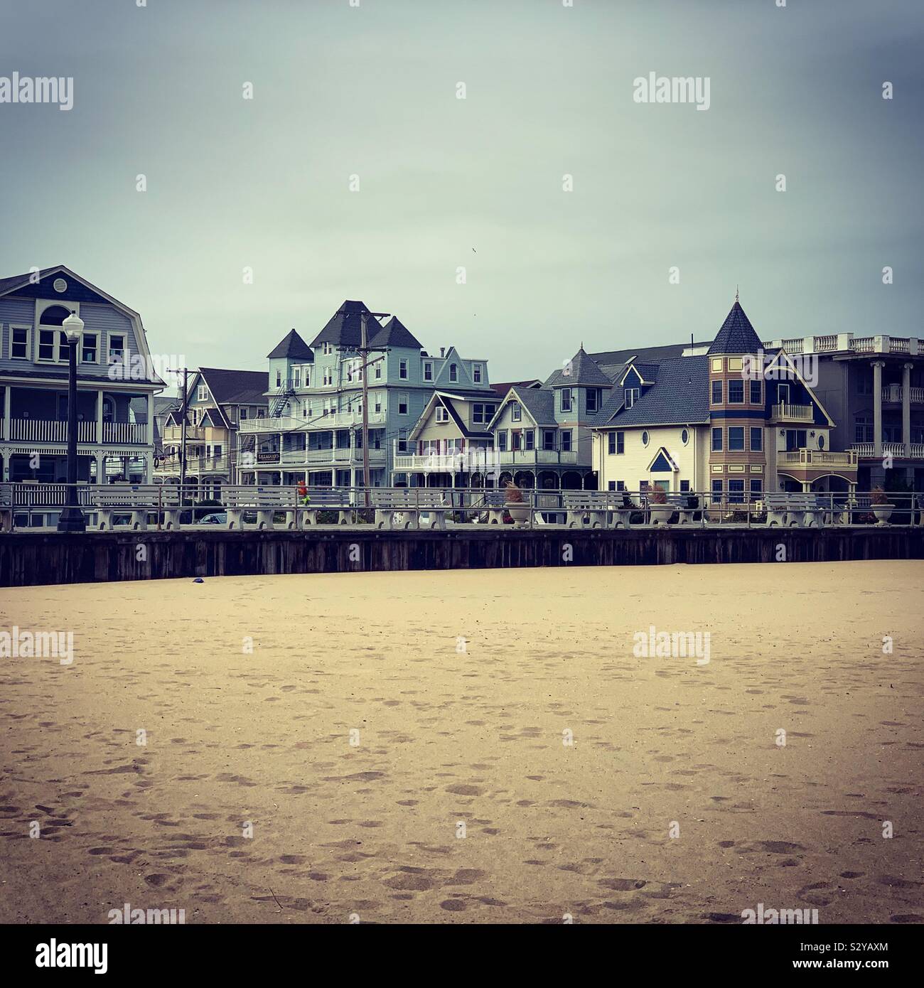 An off-season view from the beach towards the boardwalk and Victorian architecture in Ocean Grove, Neptune Township, Monmouth County, New Jersey, United States Stock Photo