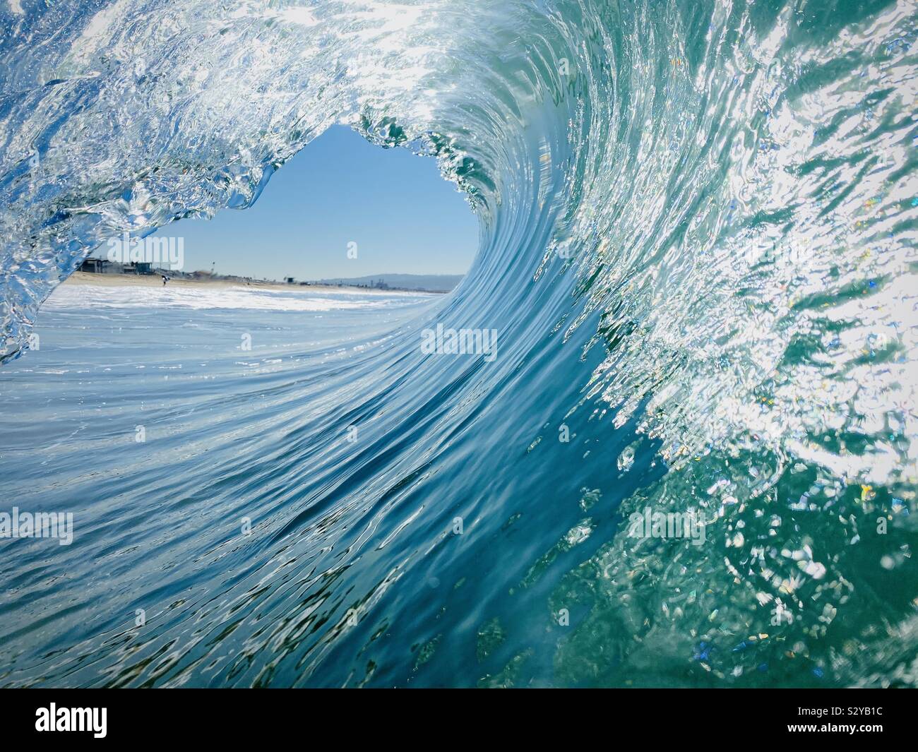 Inside, looking out of a barreling wave. Manhattan Beach, California USA. Stock Photo