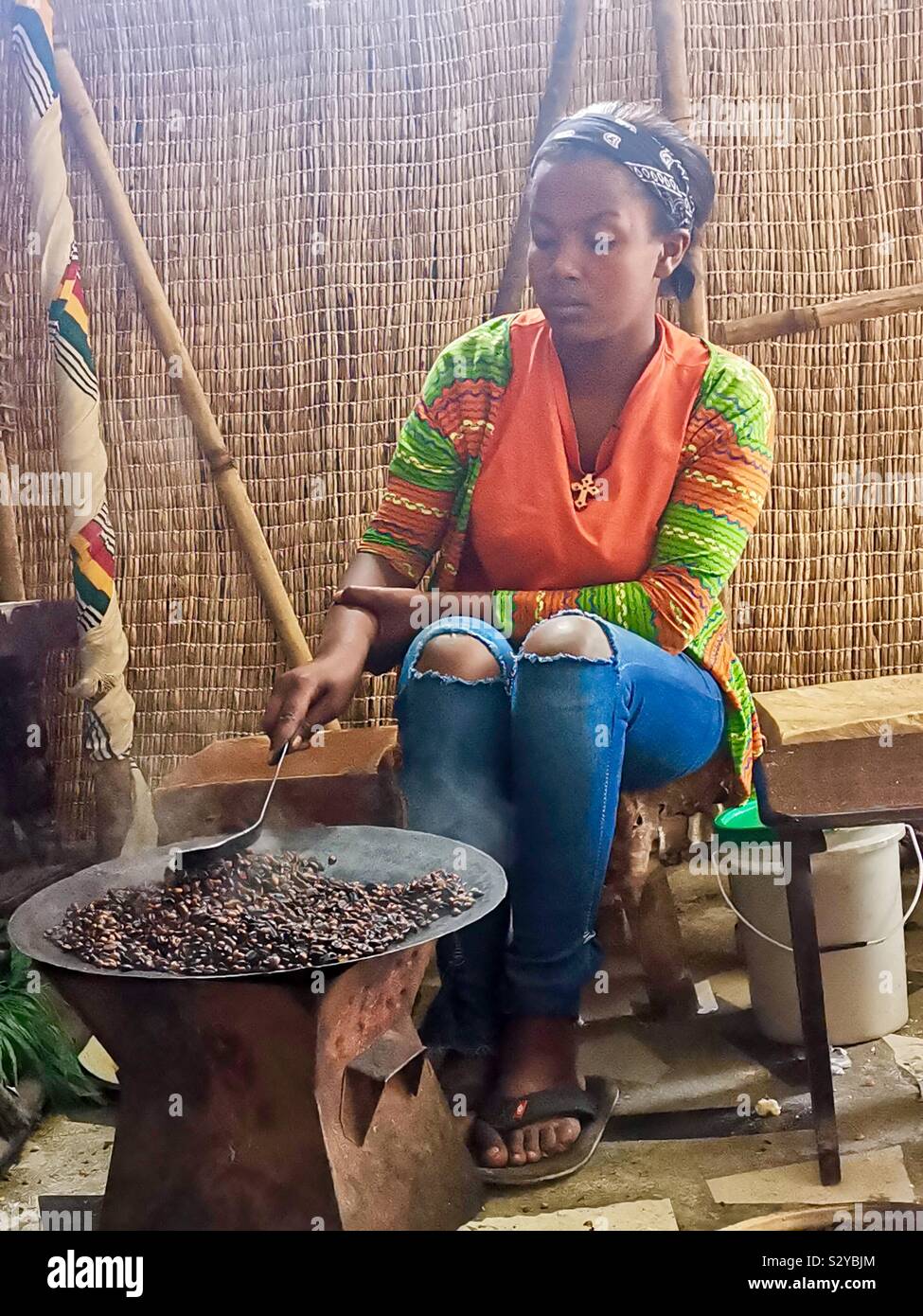 Roasting Coffee in a small traditional Ethiopian coffee shop. - Smartphone Captured Stock Image