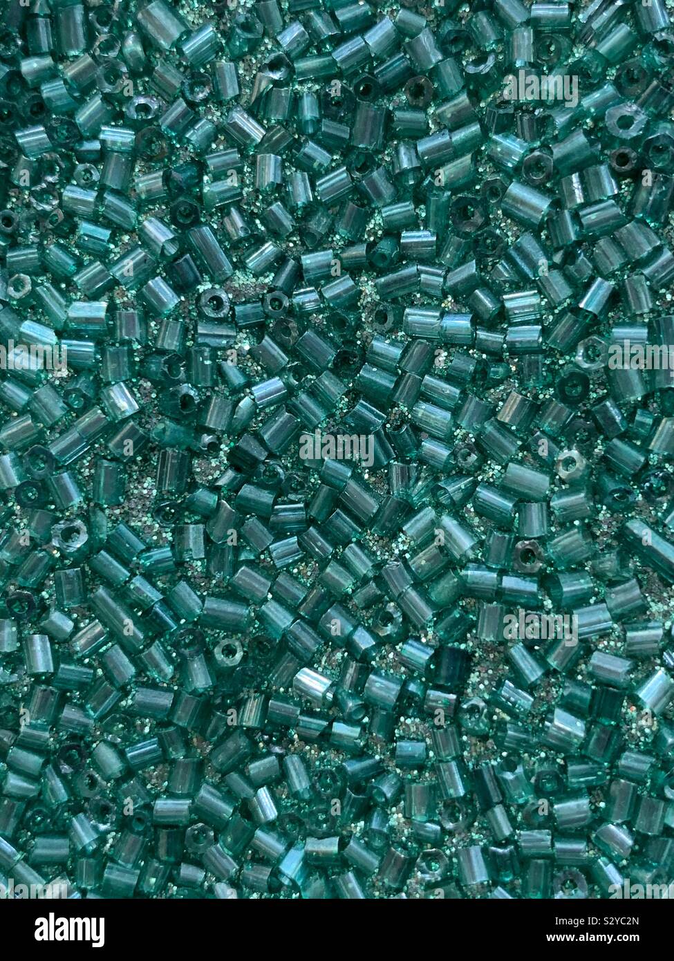 Full frame of blue green glitter and sparkly beads - Smartphone Captured Stock Image